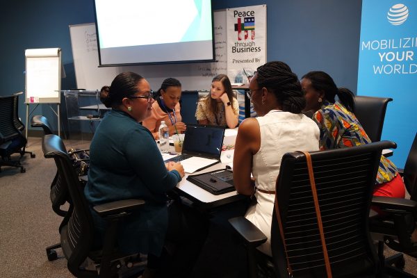 Volunteer business coaches working with PTB® students during Leadership Development 2018 at AT&T University in Las Colinas, TX