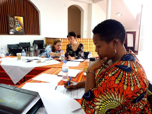 Christine Hategekimana (PTB® class of 2017) hard at work on the PTB® loan committee in Rwanda along with IEEW March 2018 delegation members Nancy Hyde and Mary Blankenship Pointer.